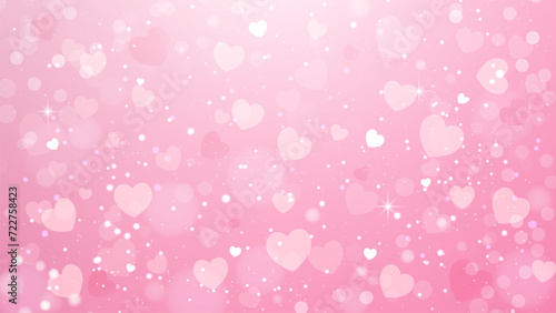 Valentine s day background with heart shaped bokeh. Defocused pink background with heart shape bokeh lights.