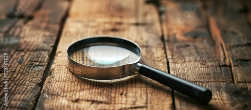 Retro Magnifying Glass on wooden table. Generated AI image photo