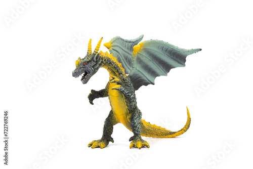 Plastic dragon toy on white background. The Simbol of new year 2024.