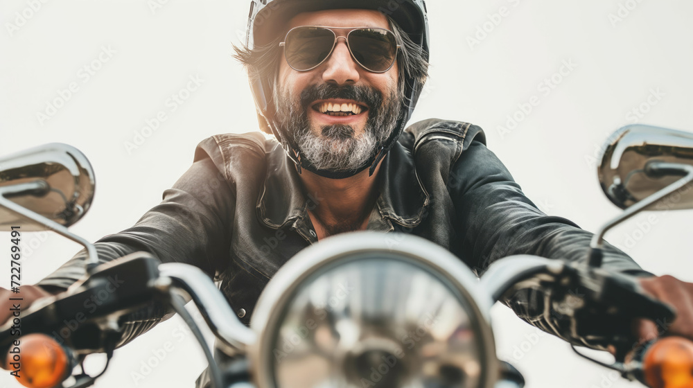 Close-up image of a biker in high spirits
