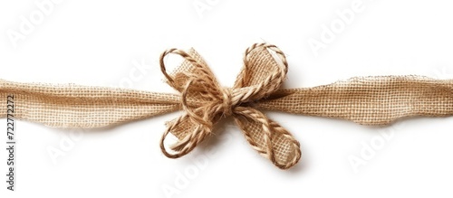 Closeup brown bow twine on white background. Generated AI image