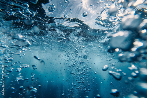 Extreme close-up of underwater splash with bubbles  use a high shutter speed to freeze the moment of beauty...