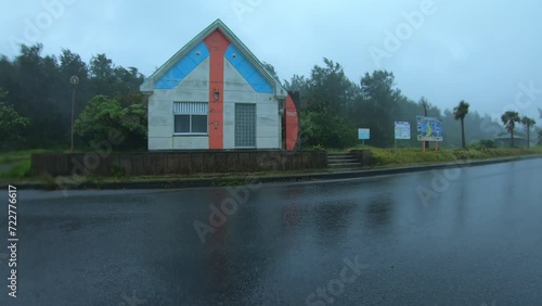 Heavy Rain And Strong Wind Blow Across Road During Hurricane - Haishen photo