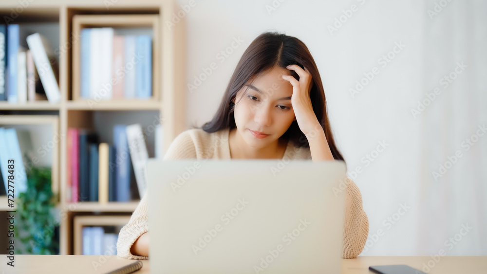 Office syndrome. Overworked tired young asian woman feeling headache, having eyesight problem after computer laptop work. Stressed young woman suffering from fatigue at home Office syndrome. Overworked tired young asian woman feeling headache, having eyesight problem after computer laptop work. Stressed young woman suffering from fatigue at home