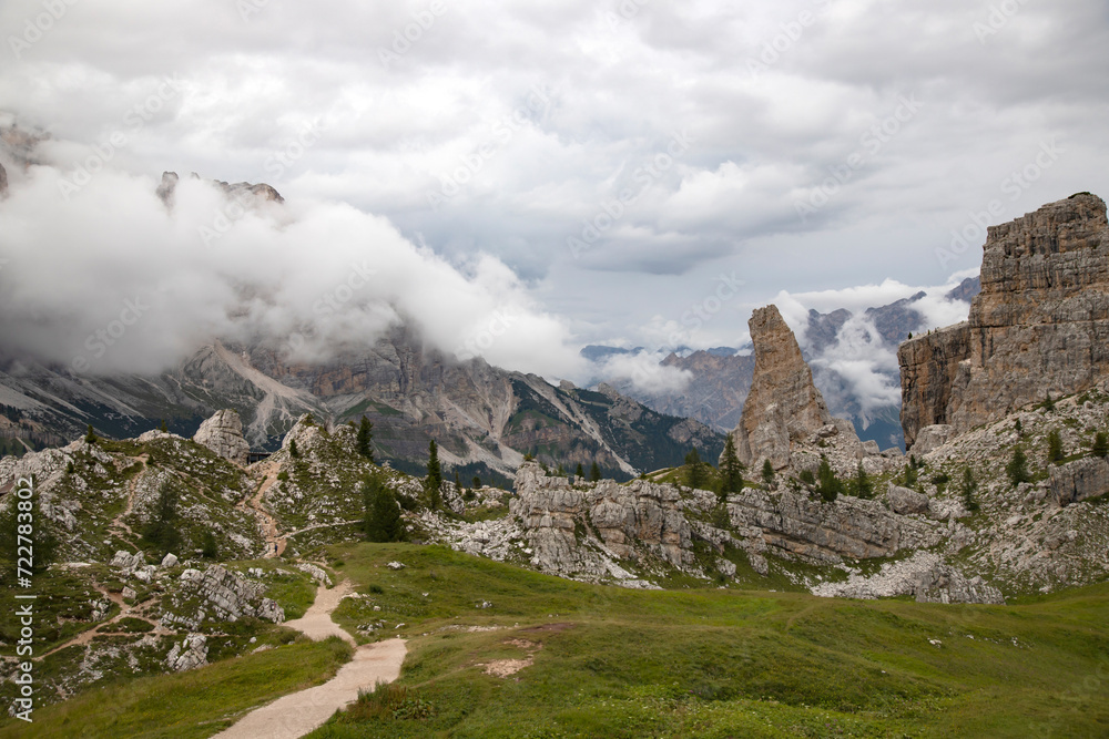 Cinque Torri in beautiful summer mist, Dolomiti Alps, Italy.