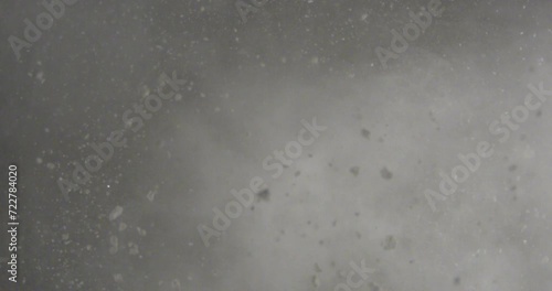 Effects element of an explosion using a pile of dust and compressed air, with camera aimed down from above. Gravity eventually takes over. Resolution: 2048 x 1080 at 24fps photo