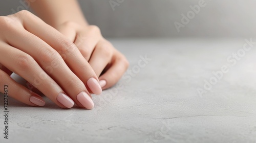 Elegant Hands with Perfectly Manicured Pink Nails photo