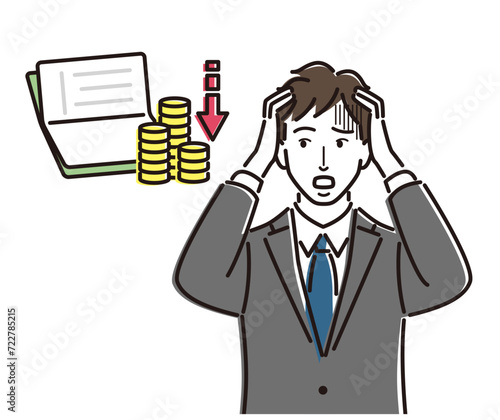 通帳の残高に頭を抱えるビジネスマン