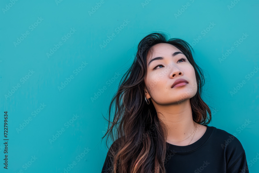 Asian woman portrait isolated on a copy space color background for text Asian woman portrait isolated on a copy space color background for text