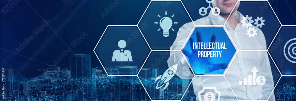 Fototapeta premium Business, technology, internet and network concept. Virtual screen of the future and sees the inscription: Intellectual property.