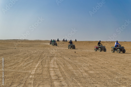 Obraz na płótnie Tourists during quad safari in desert near Hurghada, Egypt. w salonie