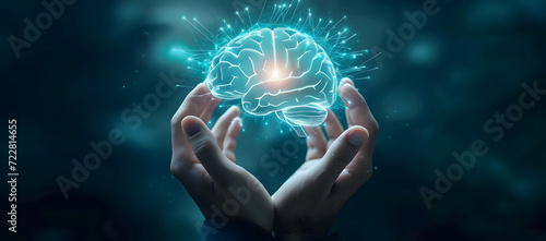 A hand holding a brain icon represents futuristic thinking and innovation. The bright, glowing brain icon floats above the hand, symbolizing creativity, and mind control. photo