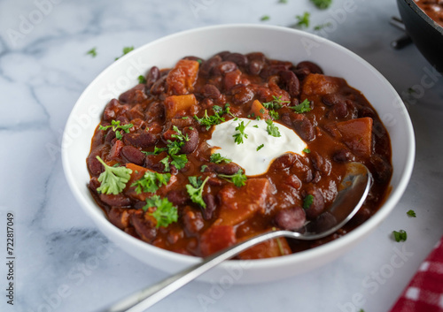 Healthy food for dinner or lunch with kidney bean stew with butternut pumpkin on a plate