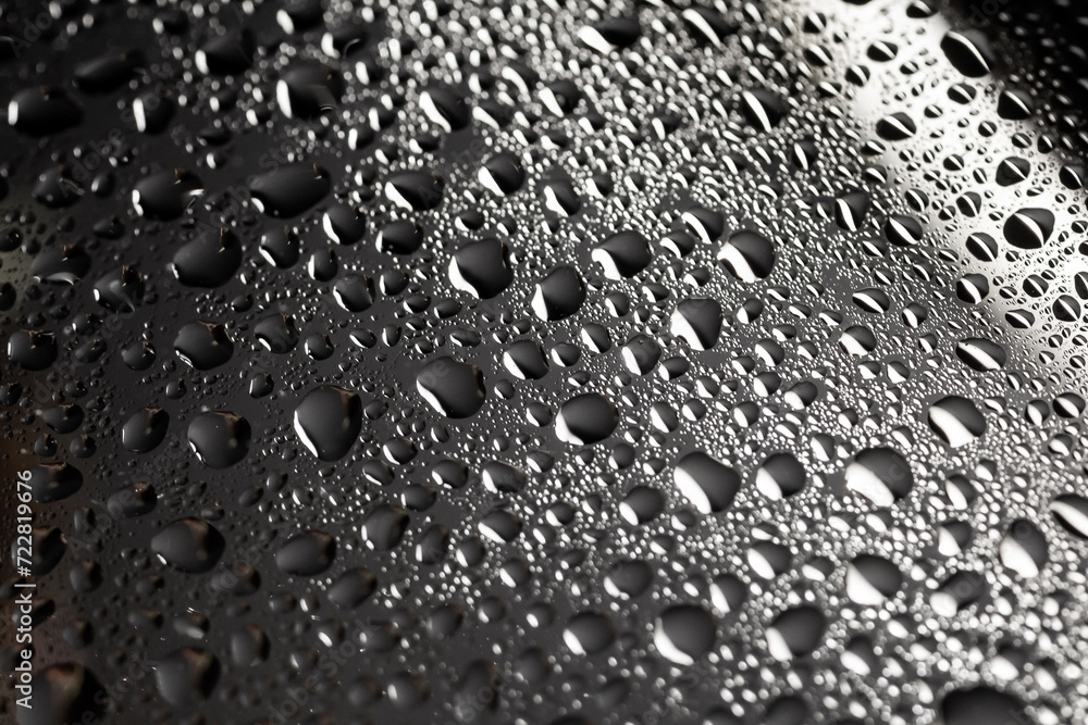 Drops of water on a color background. Selective focus. Gray Drops of water on a color background. Selective focus. Gray