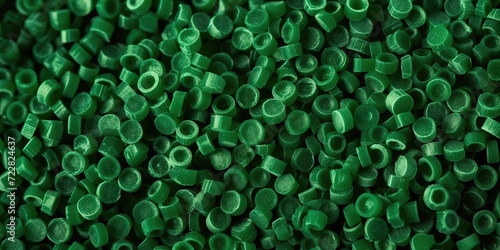  3d green tiny plastic cylindrical grains ,green plastic polymer pellets,polymer for pipes, Plastic and polymer industry, green PVC granulate.Microplastic products.