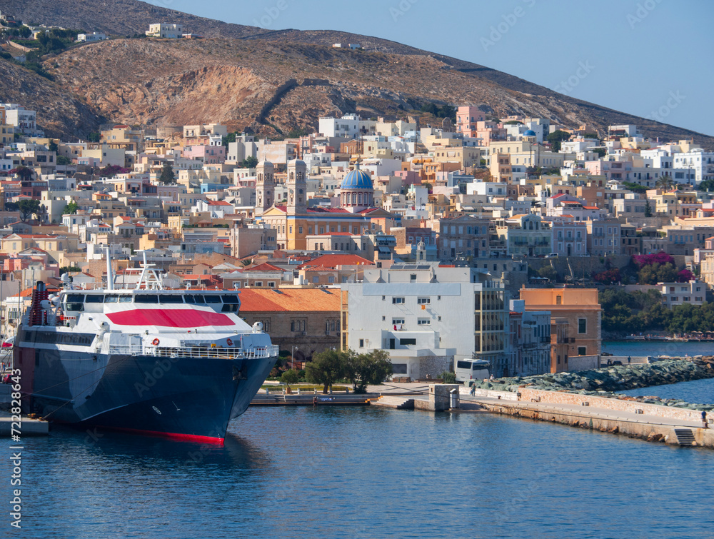 Panoramic view of Ermoupolis city Syros Island with ferries and cruise liners in Greece