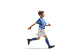 Boy in a blue and white football kit running fast