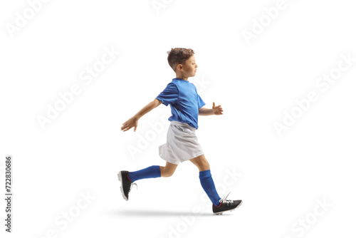 Boy in a blue and white football kit running fast © Ljupco Smokovski