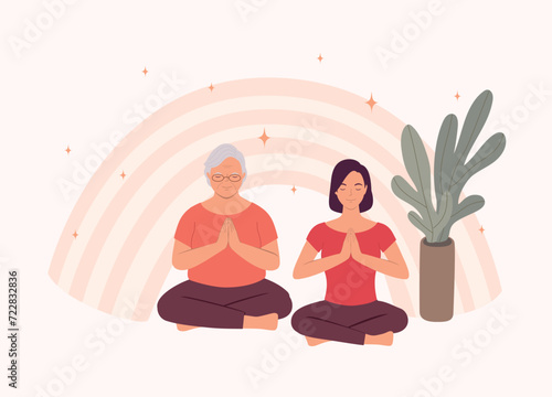 Smiling Elderly Mother And Adult Daughter With Prayer Pose Sitting On Floor And Practicing Yoga. Full Length.