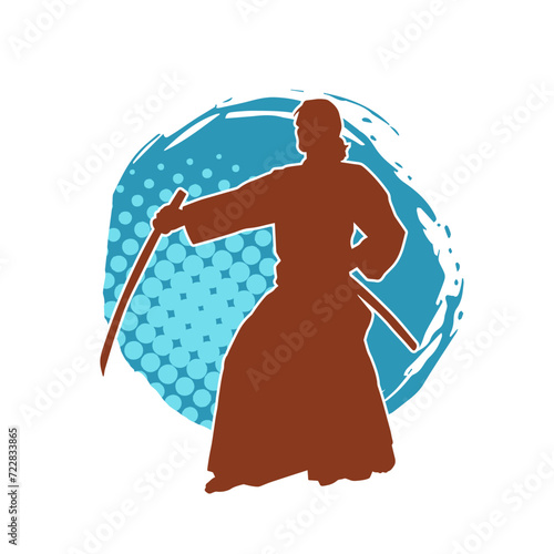 Silhouette of a sword warrior in action pose. Silhouette of a martial art person carrying sword weapon. Silhouette of kendo martial art pose.
