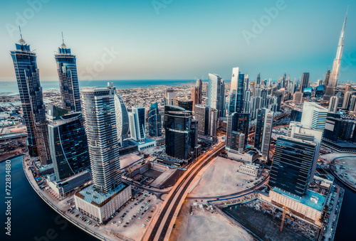 Scenic panoramic view of modern city architecture. Skyline of Dubai, UAE, with skyscrapers. Travel background.