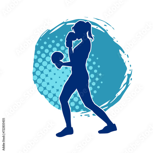 Silhouette of woman boxing athlete in action pose. Silhouette of a female wearing boxing gloves for boxing sport.
