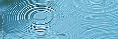 close blue water ripples, blue water surface, water drops on water