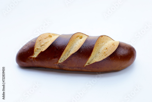 Plain Laugen bread on white background. photo