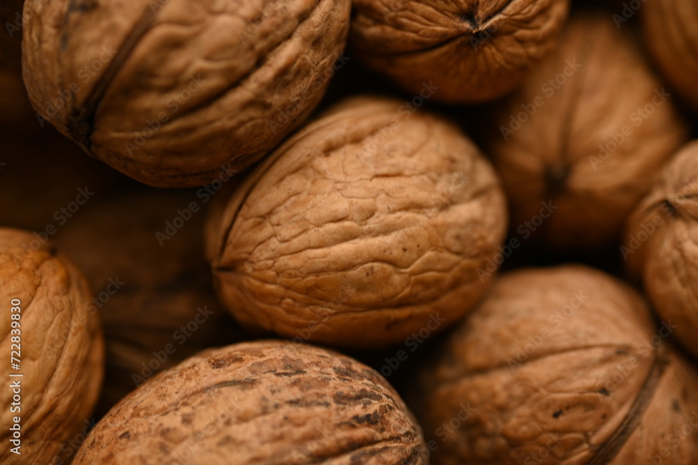 Top view of whole walnuts as background texture Top view of whole walnuts as background texture