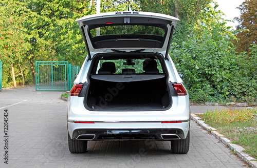 Modern SUV open trunk. Modern car with open empty trunk. Modern wagon car open trunk. Car boot is open.