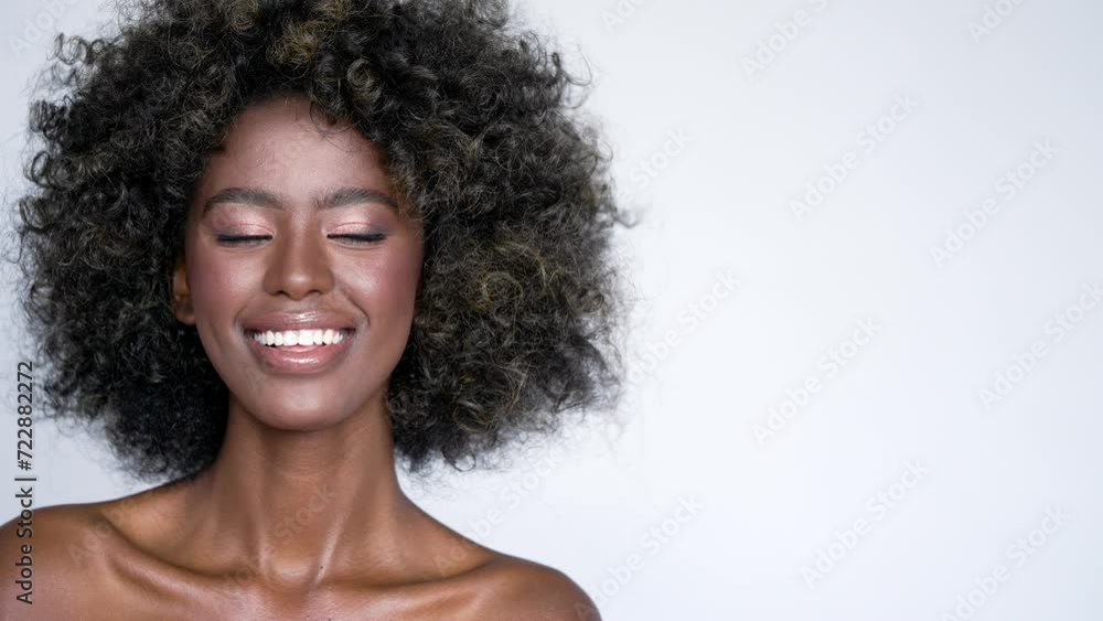 Smiling black woman with curly hair Smiling black woman with curly hair
