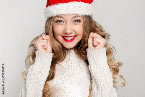 Beautiful female model wear santa hat