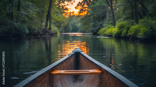 Leinwand Poster A canoe on a tranquil river, with lush forests on either side as the background,