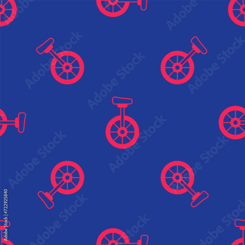 Red Unicycle or one wheel bicycle icon isolated seamless pattern on blue background. Monowheel bicycle. Vector