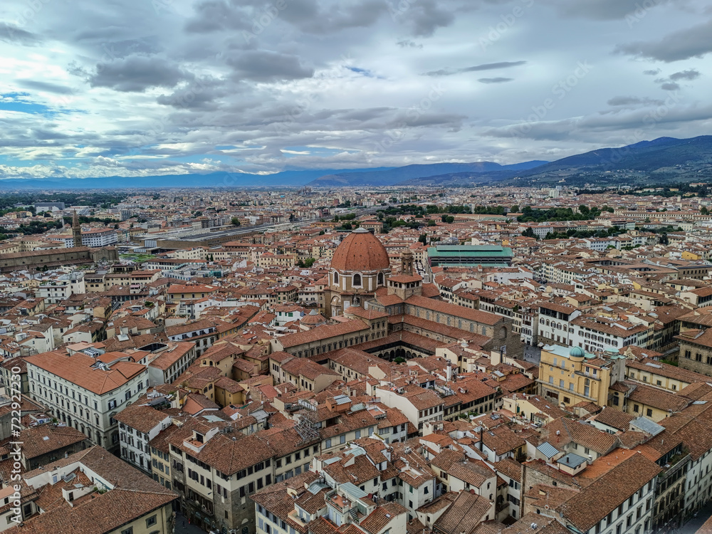 City architecture in aerial view with Dome of the Medici chapel, Santa Maria Novella basilica and station, Florence ITALY