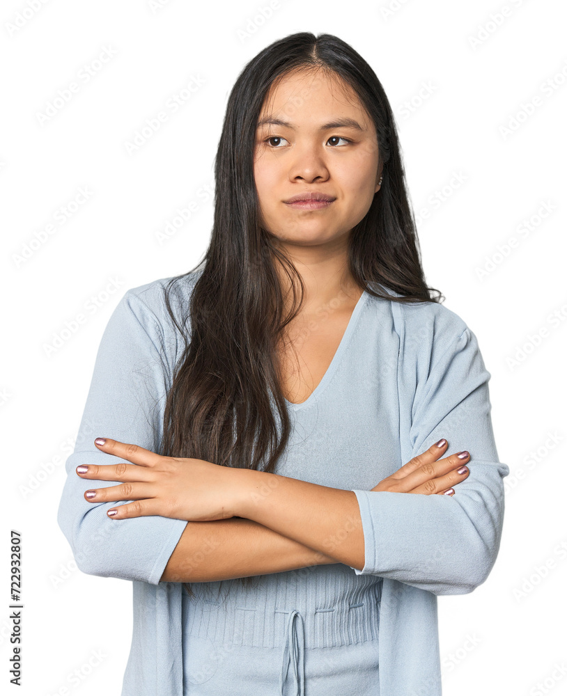 Young chinese woman isolated dreaming of achieving goals and purposes Young chinese woman isolated dreaming of achieving goals and purposes