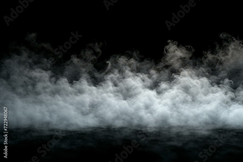 White smoke or fog cloud isolated on black background. Abstract background element. Texture for designers. White cloudiness. Mist or haze. Chemical reaction. Dry ice smoke.