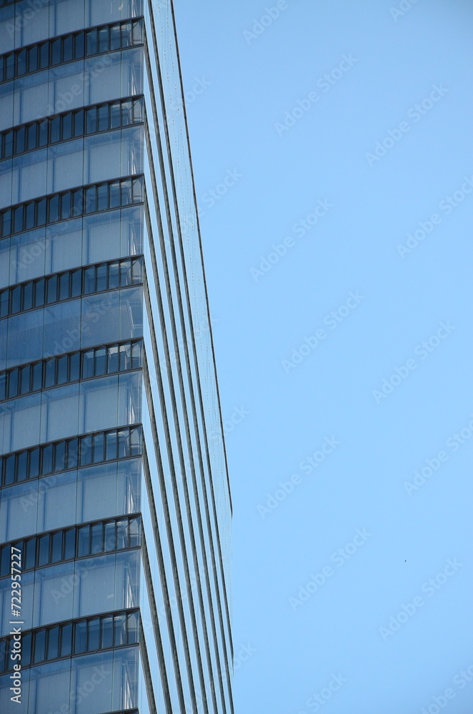 Reflection of the building in the windows of a modern office building Reflection of the building in the windows of a modern office building