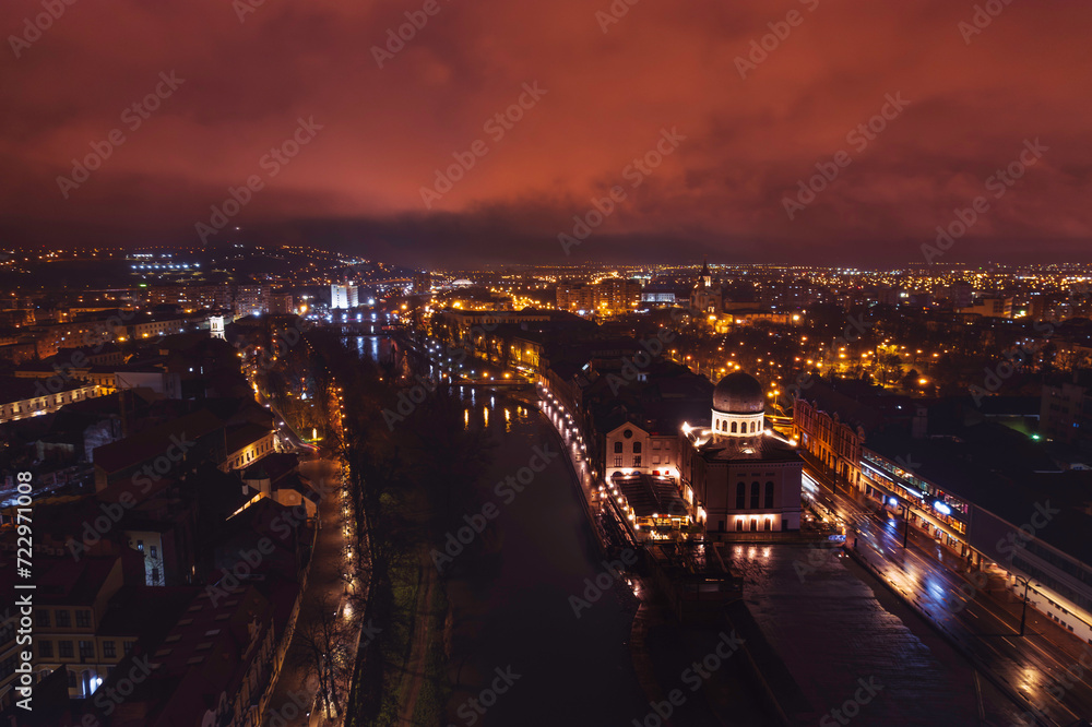 Luminous Symphony: Mesmerizing Aerial View of Oradeas Glittering Night Lights