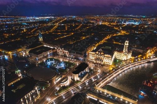 Glimmers of Life  Captivating Nighttime Aerial View of Oradea  Romanias Vibrant Cityscape