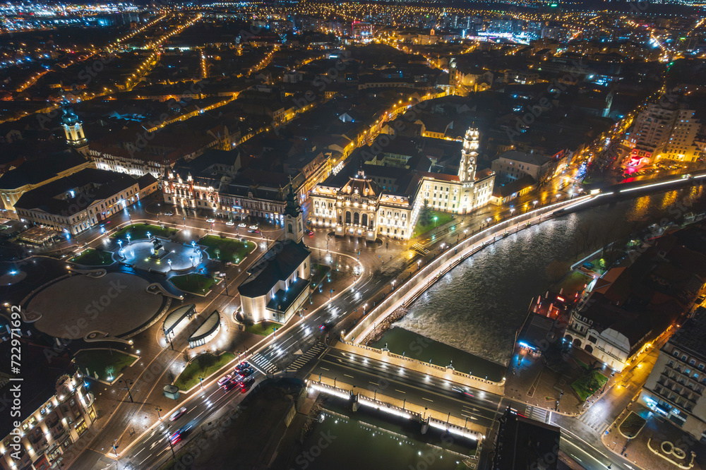 Celestial Symphony: A Captivating Aerial View of Oradea, Romania, Illuminated at Night