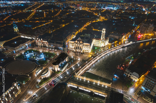 Luminescent Symphony: Captivating Aerial Glimpse of Oradea, Bihor, Romanias Vibrant Night Cityscape