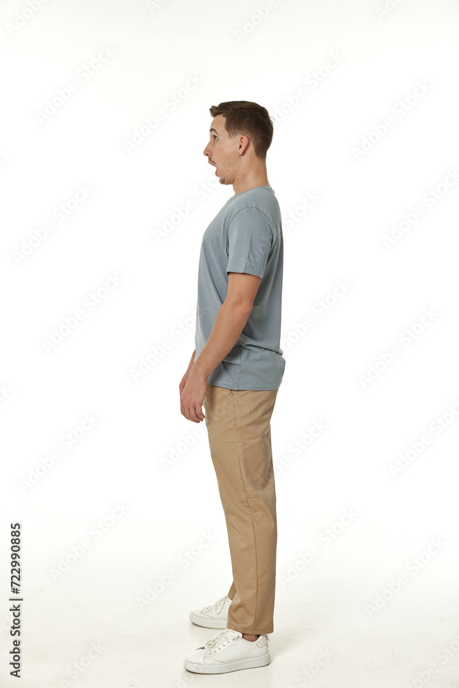 surprised guy looking at camera on white studio background surprised guy looking at camera on white studio background