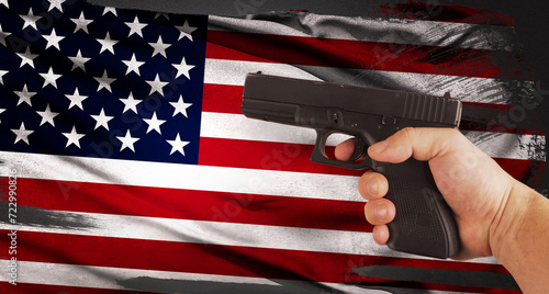 Handgun on American flag background. Gun law concept. USA.
