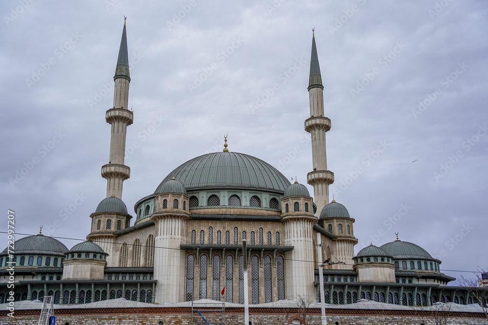Taksim Square Mosque in front of Republic Monument Istanbul Turkey