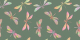 multicolored abstract dragonflies drawn in watercolor on a green background, seamless pattern for wallpaper design