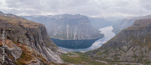 Man in mountains, Trolltunga , Norway photo