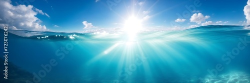 Underwater Panorama. Captivating Views of the Azure Sky and Sunlight Rays Illuminating the Depths
