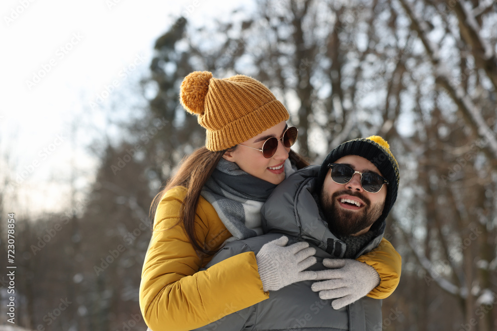 Happy young couple having fun outdoors on winter day Happy young couple having fun outdoors on winter day
