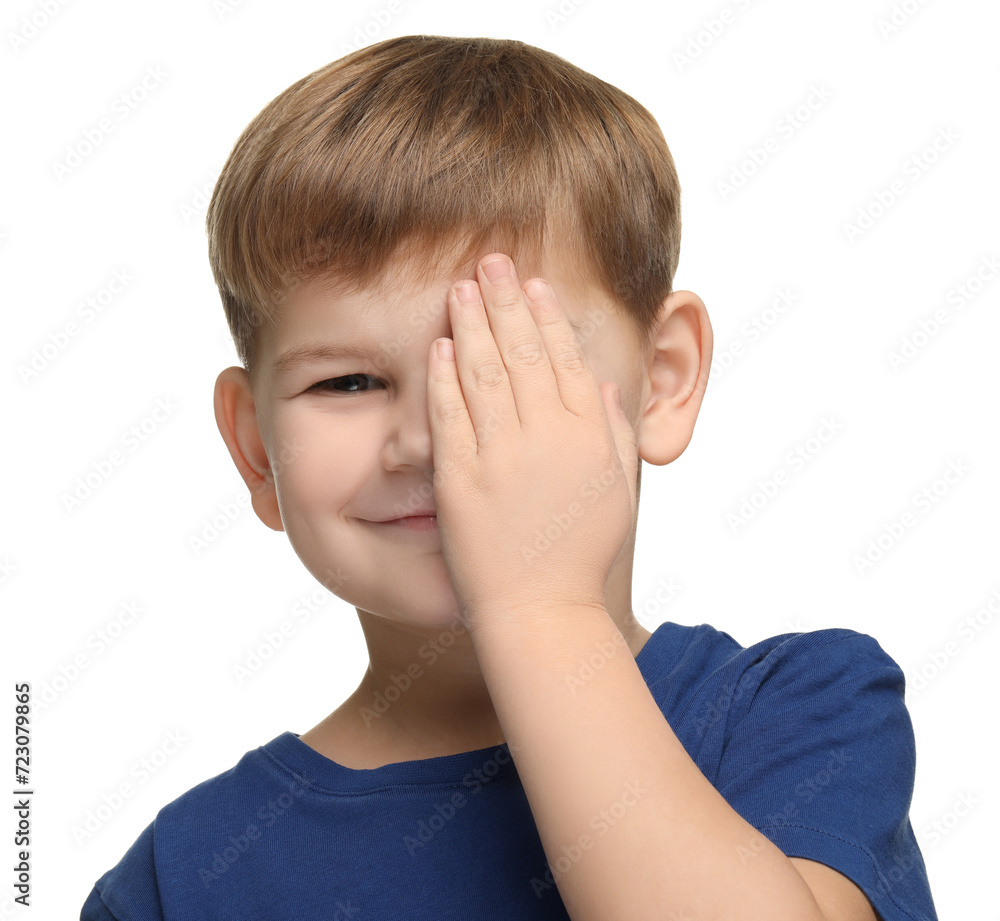 Little boy covering his eye on white background Little boy covering his eye on white background